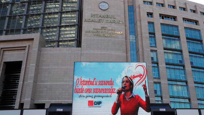 A picture of main opposition Republican People's Party's (CHP) Istanbul chair Canan Kaftancioglu is displayed on a screen outside the Justice Palace, the Caglayan courthouse, in Istanbul, Turkey, September 6, 2019. REUTERS/Murad Sezer - RC1B167BFEA0