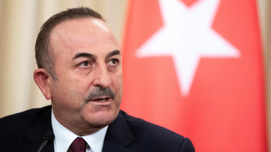 Turkish Foreign Minister Mevlut Cavusoglu speaks during a joint news conference following talks with Russian Foreign Minister Sergei Lavrov in Moscow, Russia January 13, 2020. Pavel Golovkin/Pool via REUTERS - RC24FE9JQ0NF
