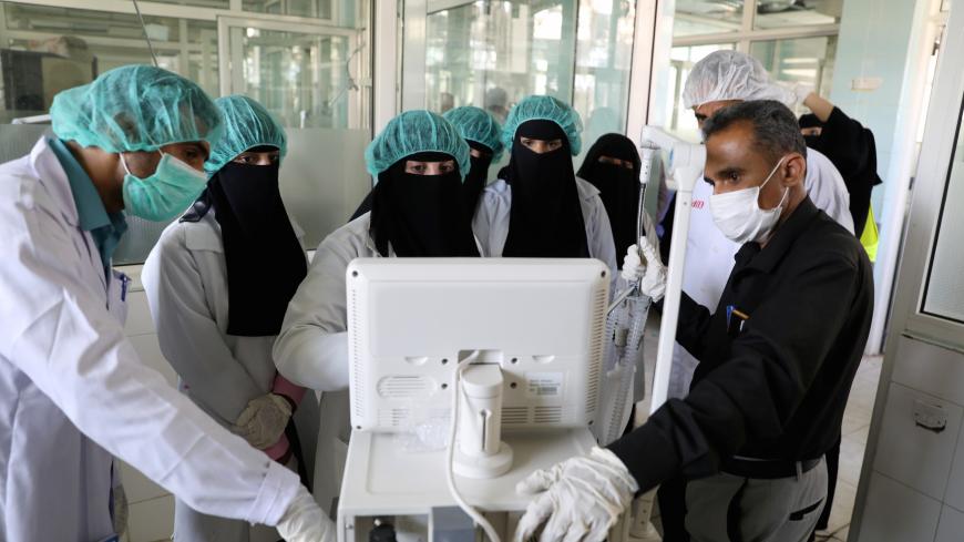 Nurses receive training on using ventilators, recently provided by the World Health Organization at the intensive care ward of a hospital allocated for novel coronavirus patients in preparation for any possible spread of the coronavirus disease (COVID-19), in Sanaa, Yemen April 8, 2020. Picture taken April 8, 2020. REUTERS/Khaled Abdullah - RC231G9K4EXG