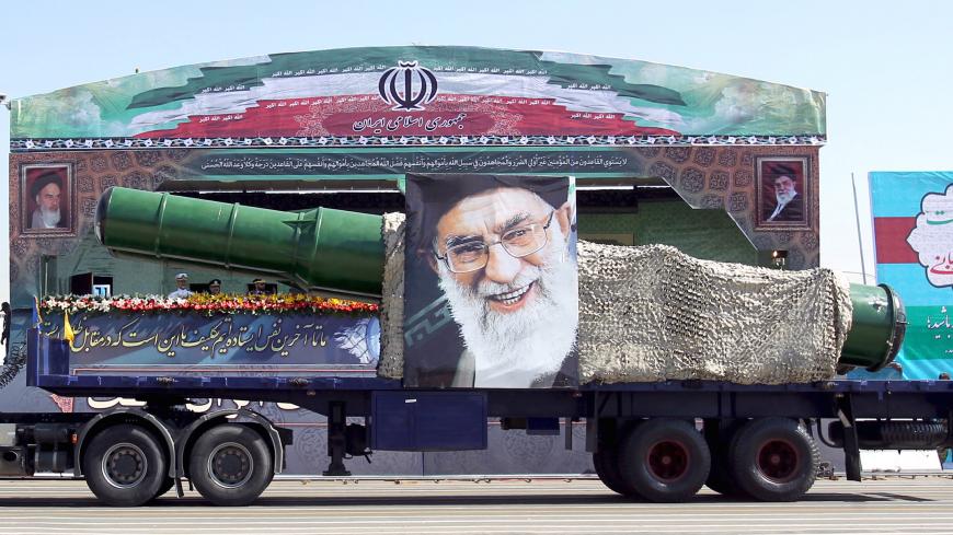 A military truck carrying a missile and a picture of Iran's Supreme Leader Ayatollah Ali Khamenei is seen during a parade marking the anniversary of the Iran-Iraq war (1980-88), in Tehran September 22, 2015. REUTERS/Raheb Homavandi/TIMAATTENTION EDITORS - THIS PICTURE WAS PROVIDED BY A THIRD PARTY. REUTERS IS UNABLE TO INDEPENDENTLY VERIFY THE AUTHENTICITY, CONTENT, LOCATION OR DATE OF THIS IMAGE. FOR EDITORIAL USE ONLY. NOT FOR SALE FOR MARKETING OR ADVERTISING CAMPAIGNS. NO THIRD PARTY SALES. NOT FOR USE 