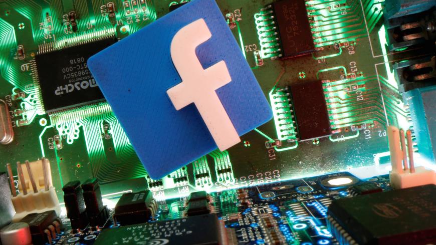 Facebook symbol is seen on a motherboard in this picture illustration taken April 24, 2020. REUTERS/Dado Ruvic /Illustration - RC23BG9UMCTS