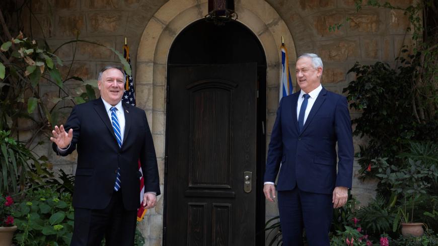 U.S. Secretary of State Mike Pompeo meets with Israeli Blue and White party leader Benny Gantz in Jerusalem May 13, 2020. Sebastian Scheiner/Pool via REUTERS - RC2ONG9Y03BM