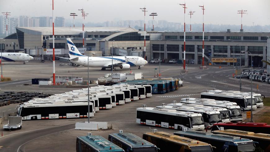An Israeli flag carrier El Al Airlines plane is seen on the tarmac as Israel's airport authority announced a pilot programme revealing what passengers leaving Israel should except as air travel gradually returns to normal after weeks of bare minimum flights due to the coronavirus disease (COVID-19) outbreak, at Ben Gurion International Airport, in Lod, near Tel Aviv, Israel May 14, 2020. REUTERS/Ronen Zvulun - RC27OG974QQK
