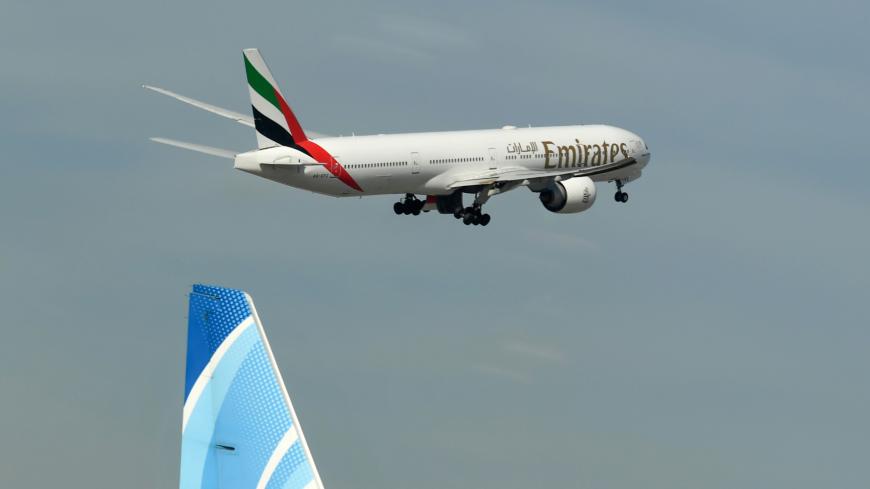 An Emirates aircraft takes off from Dubai International Airport on April 6, 2020, as Emirates Airline resumed a limited number of outbound passenger flights after its COVID-19 coronavirus-enforced stoppage. (Photo by KARIM SAHIB / AFP) (Photo by KARIM SAHIB/AFP via Getty Images)