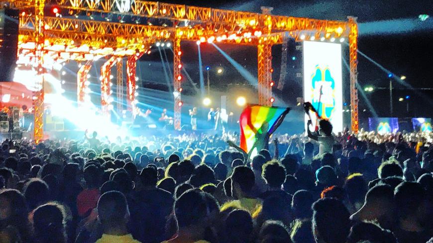 Fans of the Lebanese group Mashrou Leila show a a rainbow flag at the concert in Cairo, Egypt, 22 September 2017. The perhaps most famous Indie Rock band of the Arabic World is banned from Egypt because of rainbow flags at their concert, told the Egyptian organisation for musicians the German Press Agency dpa.
(Best quality) Photo: Benno Schwinghammer/dpa (Photo by Benno Schwinghammer/picture alliance via Getty Images)