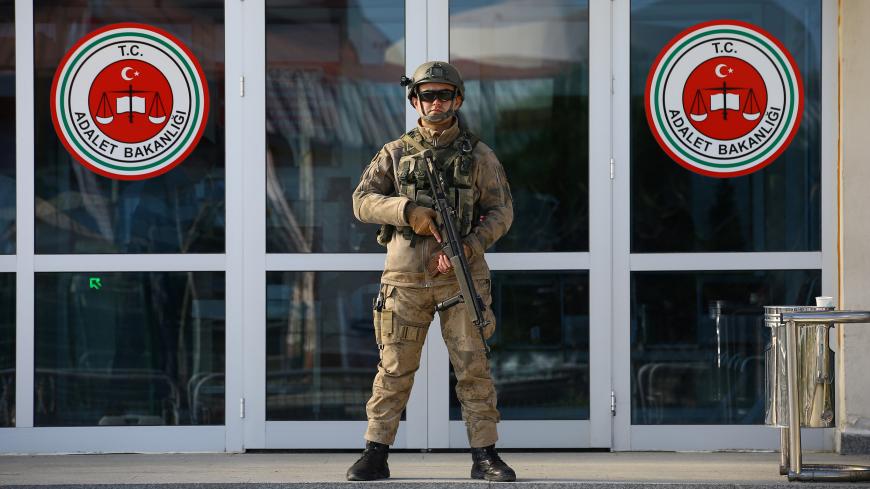 A Turkish soldier stands guard outside the Silivri Prison and Courthouse complex near Istanbul, Turkey March 9, 2018. REUTERS/Huseyin Aldemir - RC15BE5D1D20