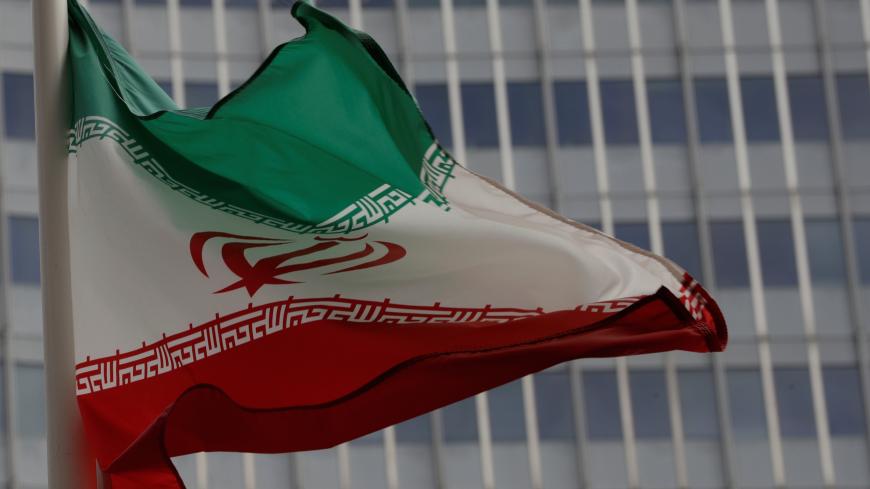 An Iranian flag flutters in front of the International Atomic Energy Agency (IAEA) headquarters in Vienna, Austria September 9, 2019.   REUTERS/Leonhard Foeger - RC1DCEC85C40