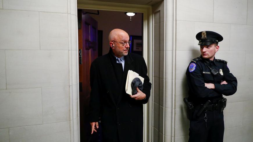 House Judiciary Committee member Rep. Ted Deutch (D-FL) exits the cloak room following a markup session of articles of impeachment against U.S. President Donald Trump on Capitol Hill in Washington, U.S., December 12, 2019. REUTERS/Tom Brenner - RC25UD92WA9N