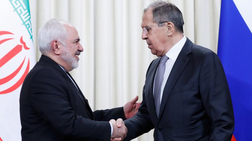 Iran's Foreign Minister Mohammad Javad Zarif shakes hands with Russia's Foreign Minister Sergei Lavrov  after a news conference following their meeting in Moscow, Russia, December 30, 2019. REUTERS/Evgenia Novozhenina - RC2N5E98ZR59