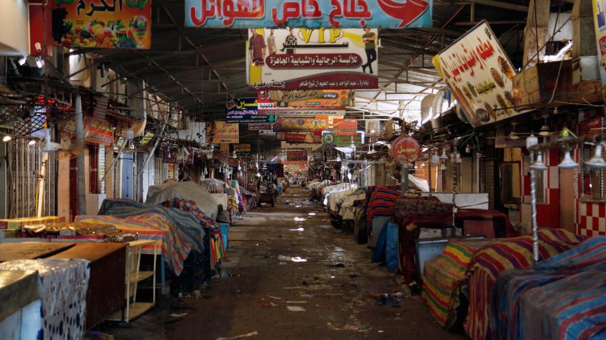 The Nabi Younes market is seen empty during a curfew imposed by Iraqi authorities, following the outbreak of coronavirus, in east Mosul, Iraq March 15, 2020. REUTERS/Abdullah Rashid - RC29KF9K7L0M