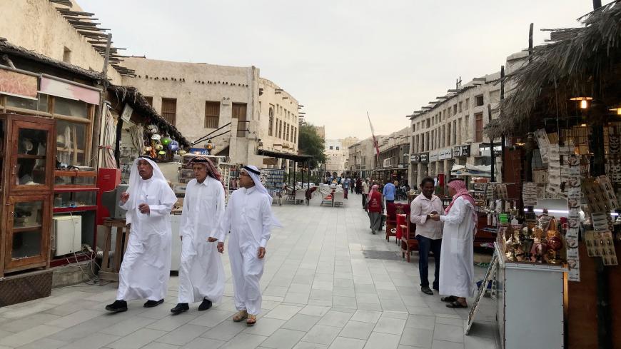 People walk at souq Waqif, following the outbreak of coronavirus, in Doha, Qatar March 12,2020. Picture taken  March 12,2020 REUTERS/stringer - RC2CKF9QEYJM