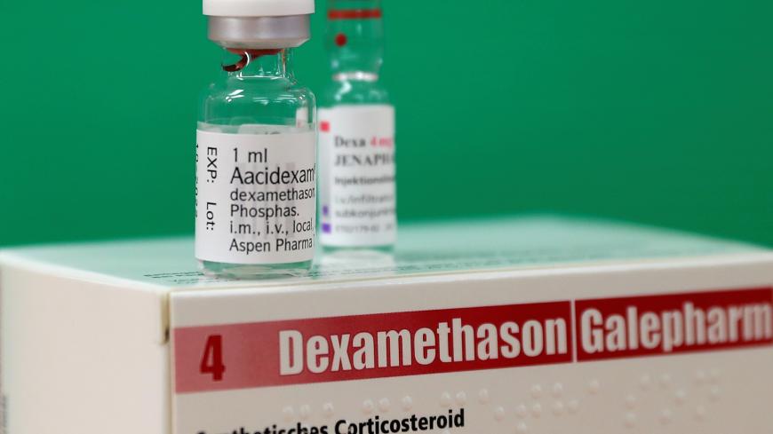 An ampoule of Dexamethasone is seen during the coronavirus disease (COVID-19) outbreak in this picture illustration taken June 17, 2020. REUTERS/Yves Herman/Illustration - RC23BH9ZVDAF