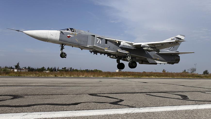 FILES - A Sukhoi Su-24 fighter jet takes off from the Hmeymim air base near Latakia, Syria, in this handout photograph released by Russia's Defence Ministry on October 22, 2015. REUTERS/Ministry of Defence of the Russian Federation/Handout via Reuters ATTENTION EDITORS - THIS PICTURE WAS PROVIDED BY A THIRD PARTY. REUTERS IS UNABLE TO INDEPENDENTLY VERIFY THE AUTHENTICITY, CONTENT, LOCATION OR DATE OF THIS IMAGE. EDITORIAL USE ONLY. NOT FOR SALE FOR MARKETING OR ADVERTISING CAMPAIGNS - TM3EC9K1AWQ01