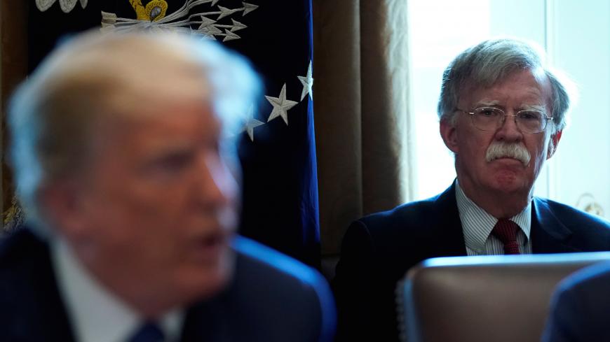New National Security Adviser John Bolton listens as U.S. President Donald Trump holds a cabinet meeting at the White House in Washington, U.S., April 9, 2018. REUTERS/Kevin Lamarque - RC19BD172000