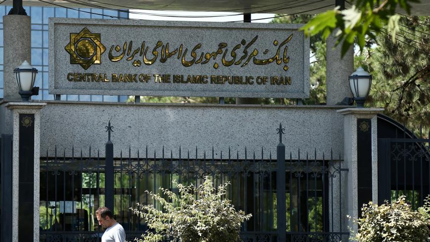 A man walks past the Central Bank of Iran in Tehran, Iran August 1, 2019. Nazanin Tabatabaee/WANA (West Asia News Agency) via REUTERS ATTENTION EDITORS - THIS IMAGE HAS BEEN SUPPLIED BY A THIRD PARTY - RC15076CC350