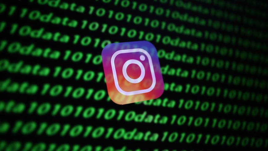 The Instagram logo and binary cyber codes are seen in this illustration taken November 26, 2019. REUTERS/Dado Ruvic/Illustration - RC20JD9467G4