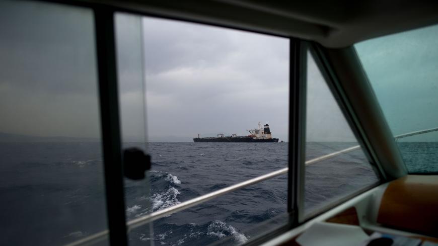 A picture shows supertanker Grace 1 off the coast of Gibraltar on July 6, 2019. - Iran demanded on July 5, 2019 that Britain immediately release an oil tanker it has detained in Gibraltar, accusing it of acting at the bidding of the United States. Authorities in Gibraltar, a British overseas territory on Spain's southern tip at the western entrance to the Mediterranean, said they suspected the tanker was carrying crude to Syria in violation of EU sanctions. (Photo by JORGE GUERRERO / AFP)        (Photo cred