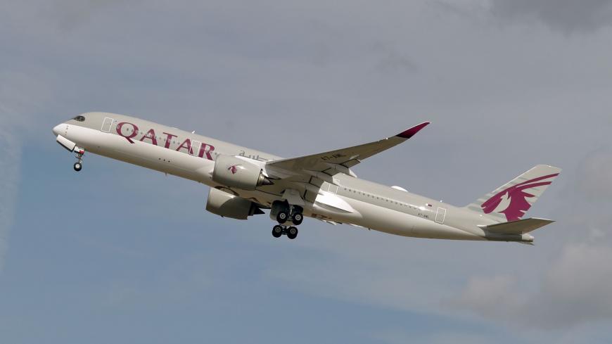 This picture taken on September 27, 2019 shows an Airbus A350 of Qatar Airways company  after taking off from the Toulouse-Blagnac airport, near Toulouse. (Photo by PASCAL PAVANI / AFP) (Photo by PASCAL PAVANI/AFP via Getty Images)