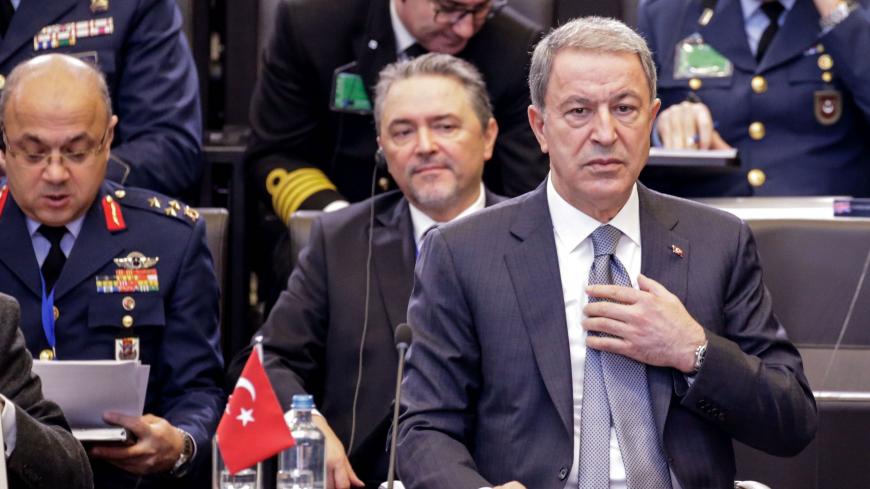 Turkish National Defense Minister Hulusi Akar attends a NATO defence ministers meeting in Brussels on February 13, 2020, to address key issues including the Alliances training mission in Iraq and the fight against international terrorism. - Ministers will also discuss NATOs presence in Afghanistan, the challenges posed by Russias missile systems and NATO-EU cooperation. (Photo by Aris Oikonomou / AFP) (Photo by ARIS OIKONOMOU/AFP via Getty Images)