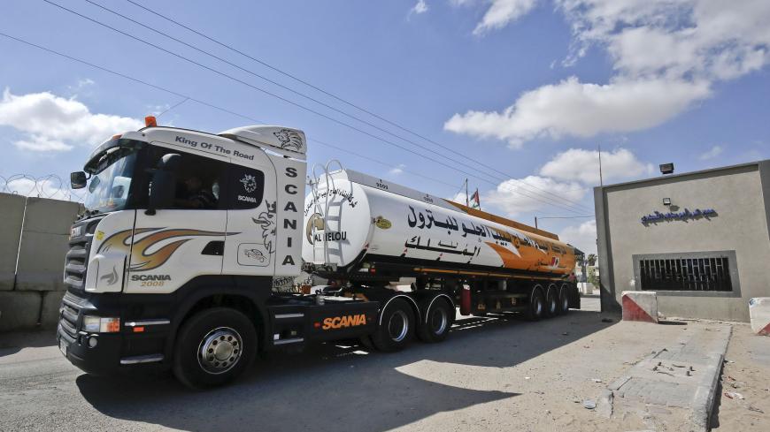 Fuel tankers arrive at Kerem Shalom crossing in the southern Gaza Strip on August 15, 2018. - Israel reopened its only goods crossing with the Gaza Strip on Wednesday in response to relative calm on the border after months of tensions prompted a blockade on most goods from July 9. (Photo by SAID KHATIB / AFP)        (Photo credit should read SAID KHATIB/AFP via Getty Images)