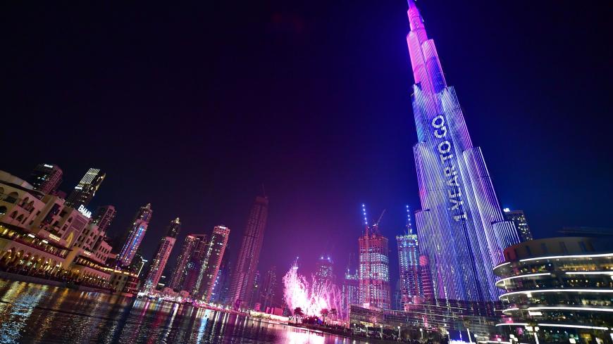 Dubai's Burj Khalifa, the worlds tallest building is illuminated during festivities marking the one-year countdown to Expo 2020, on October 20, 2019. - Fireworks exploded over the glitzy Dubai skyline today, marking the one-year countdown to Expo 2020, with the city's rulers hoping the big-budget global trade fair will end with a bang, not a fizzle. (Photo by Giuseppe CACACE / AFP) (Photo by GIUSEPPE CACACE/AFP via Getty Images)