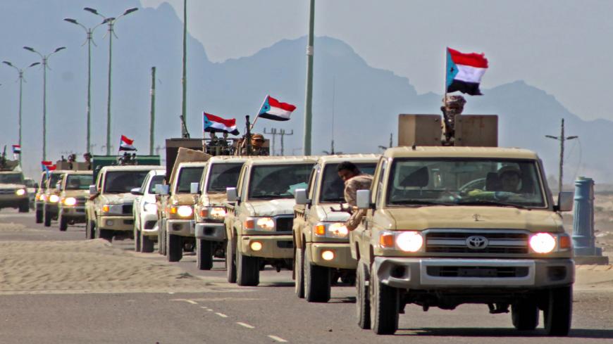 A reinforcement convoy of Yemen's Security Belt Force dominated by members of the the Southern Transitional Council (STC) seeking independence for southern Yemen, heads from the southern city of Aden to Abyan province on November 26, 2019, amid tensions with the forces of Saudi-backed President Abedrabbo Mansour Hadi. - Saudi Arabia brokered on November 5 a power sharing agreement between Yemen's internationally recognised government and southern separatists of the STC, in a bid to end infighting that had d