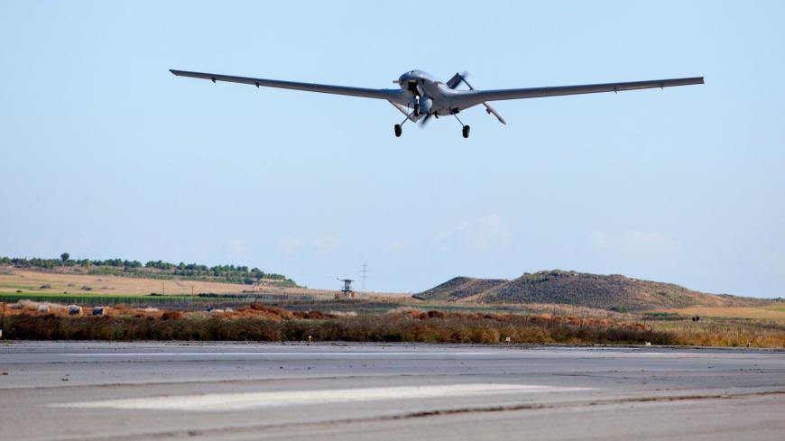 The Bayraktar TB2 drone is pictured flying on December 16, 2019 at Gecitkale Airport in Famagusta in the self-proclaimed Turkish Republic of Northern Cyprus (TRNC). - The Turkish military drone was delivered to northern Cyprus today amid growing tensions over Turkey's deal with Libya that extended its claims to the gas-rich eastern Mediterranean. The Bayraktar TB2 drone landed in Gecitkale Airport in Famagusta around 0700 GMT, an AFP correspondent said, after the breakaway northern Cyprus government approve