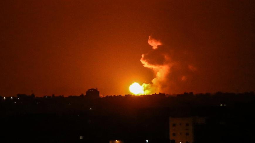 A ball of fire is seen following an Israel airstrike at Khan Yunis in the southern Gaza Strip early on June 27, 2020. - Two rockets were fired from the Hamas-controlled Gaza Strip towards Israeli territory on June 26, the army said. It was the first reported rocket fire from the Gaza Strip since early May. (Photo by SAID KHATIB / AFP) (Photo by SAID KHATIB/AFP via Getty Images)
