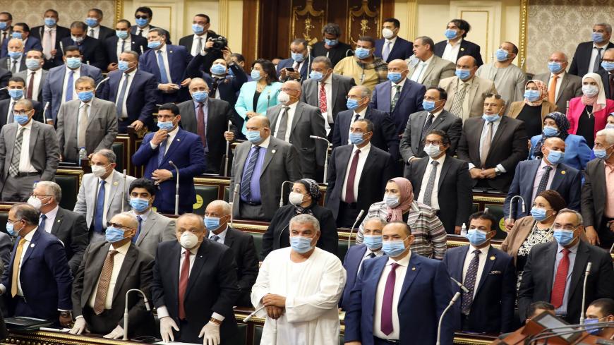 Egyptian parliament members attend a general session in the capital Cairo on July 20, 2020. - Egypt's parliament greenlighted behind a closed-doors session later today, the possible deployment of troops in Libya to support Cairo's ally Khalifa Haftar, if rival Turkish-backed forces recapture the city of Sirte, the house said. (Photo by - / AFP) (Photo by -/AFP via Getty Images)