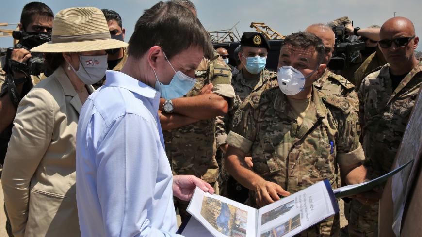 US Undersecretary of State for Political Affairs David Hale (2-L) and US Ambassador to Lebanon Dorothy Shea (L), accompanied by Lebanese army officers, tour at the site of last week's explosion that hit the seaport of the Lebanese capital Beirut, on August 15, 2020. - Hale today called for a transparent and credible probe into the explosion at Beirut's port, as FBI investigators were set to arrive in Lebanon to assist authorities. (Photo by NABIL MOUNZER / POOL / AFP) (Photo by NABIL MOUNZER/POOL/AFP via Ge