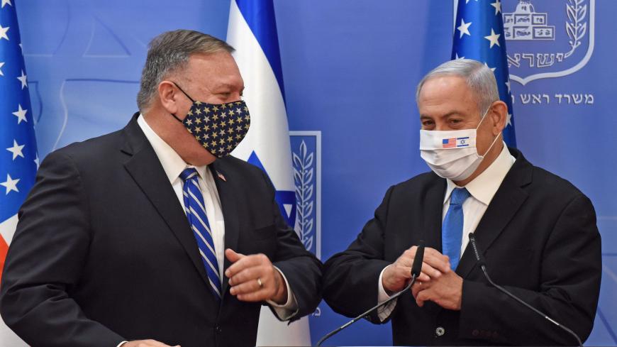 US Secretary of State Mike Pompeo (L) and Israeli Prime Minister Benjamin Netanyahu bump elbows ahead of making a joint statement to the press after meeting in Jerusalem, on August 24, 2020. - Pompeo arrived in Israel kicking off a five-day visit to the Middle East which will take him to Sudan, the United Arab Emirates, and Bahrain, focusing on Israel's normalising of ties with the UAE and pushing other Arab states to follow suit. (Photo by DEBBIE HILL / POOL / AFP) (Photo by DEBBIE HILL/POOL/AFP via Getty 