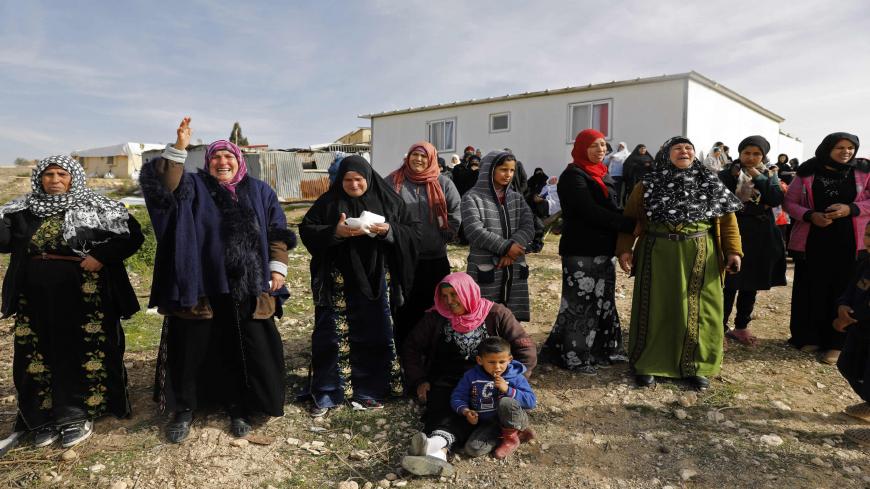 Bedouin women react during a protest against home demolitions on January 18, 2017 in the Bedouin village of Umm al-Hiran, which is not recognized by the Israeli government, near the southern city of Beersheba, in the Negev desert.
An Israeli policeman was killed while taking part in an operation to demolish homes in the Bedouin village, with authorities claiming he was targeted in a car-ramming attack. The driver was earlier reported shot dead by police as residents disputed the police version of events, sa