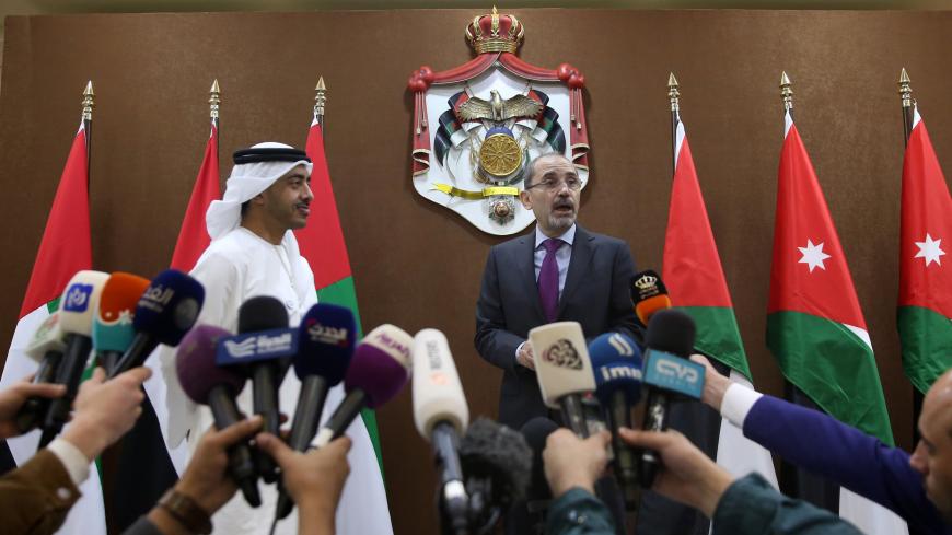Jordanian Foreign Minister Ayman Safadi (C-R) and his Emirati counterpart Sheikh Abdullah bin Zayed Al Nahyan (C-L) speak to journalists upon the latter's arrival in the capital Amman on March 13, 2018. / AFP PHOTO / Khalil MAZRAAWI        (Photo credit should read KHALIL MAZRAAWI/AFP via Getty Images)