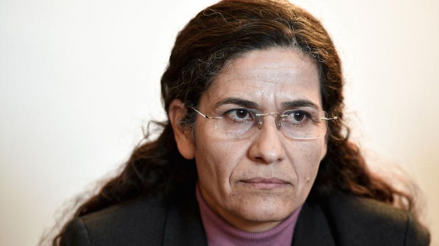 One of the two top political leaders of the Syrian Kurdish alliance and co-chair of the Syrian Democratic Council Ilham Ahmed attends a press conference, in Paris, on December 21, 2018. - Two top political leaders of the Syrian Kurdish alliance battling the Islamic State group visit Paris for talks on the planned US military withdrawal from Syria, an alliance representative said. (Photo by STEPHANE DE SAKUTIN / AFP)        (Photo credit should read STEPHANE DE SAKUTIN/AFP via Getty Images)