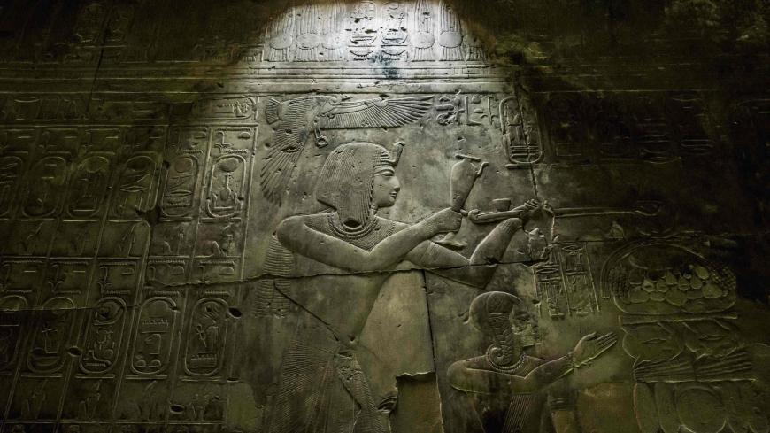 This picture taken on April 5, 2019 shows a view of hieroglyphic inscriptions and relief on a wall of the the New Kingdom period (16th-11th centuries BC) Temple of Seti I, at the archaeological site of Abydos near Egypt's southern city of Sohag, about 540 kilometres from the capital Cairo. (Photo by Khaled DESOUKI / AFP)        (Photo credit should read KHALED DESOUKI/AFP via Getty Images)