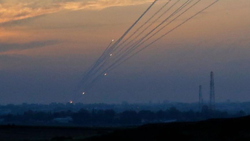 A picture taken on May 5, 2019 from the Israel-Gaza border shows a barrage of rockets being fired from the Hamas-run Palestinian enclave. - Gaza militants fired fresh rocket barrages at Israel early today in a deadly escalation that has seen Israel respond with waves of strikes as a fragile truce again faltered and a further escalation was feared. (Photo by Jack GUEZ / AFP)        (Photo credit should read JACK GUEZ/AFP via Getty Images)