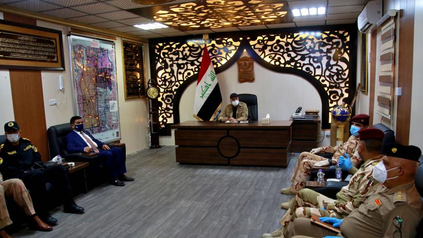 Iraqi Prime Minister Mustafa al-Kadhemi (C) chairs a meeting with military commanders in Tarmiyah, 35 kilometres (20 miles) north of Baghdad on July 20, 2020. (Photo by Khalid MOHAMMED / POOL / AFP) (Photo by KHALID MOHAMMED/POOL/AFP via Getty Images)
