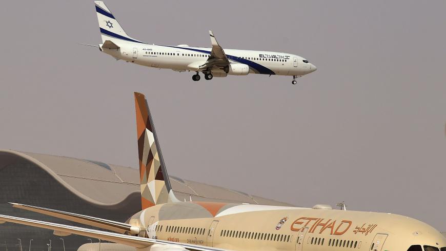 A picture taken on August 31, 2020, shows the El Al's airliner, which is carrying a US-Israeli delegation to the UAE following a normalisation accord, landing on the tarmac in the first-ever commercial flight from Israel to the UAE at the Abu Dhabi airport. - A US-Israeli delegation including White House advisor Jared Kushner took off on a historic first direct commercial flight from Tel Aviv to Abu Dhabi to mark the normalisation of ties between the Jewish state and the UAE. (Photo by Karim SAHIB / AFP) (P