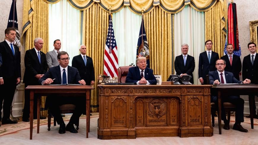 WASHINGTON, DC - SEPTEMBER 04: U.S. President Donald Trump (C) participates in a signing ceremony and meeting with the President of Serbia Aleksandar Vucic (L) and the Prime Minister of Kosovo Avdullah Hoti (R) in the Oval Office of the White House on September 4, 2020 in Washington, DC. The Trump administration is hosting the leaders to discuss furthering their economic relations. (Photo by Anna Moneymaker-Pool/Getty Images)