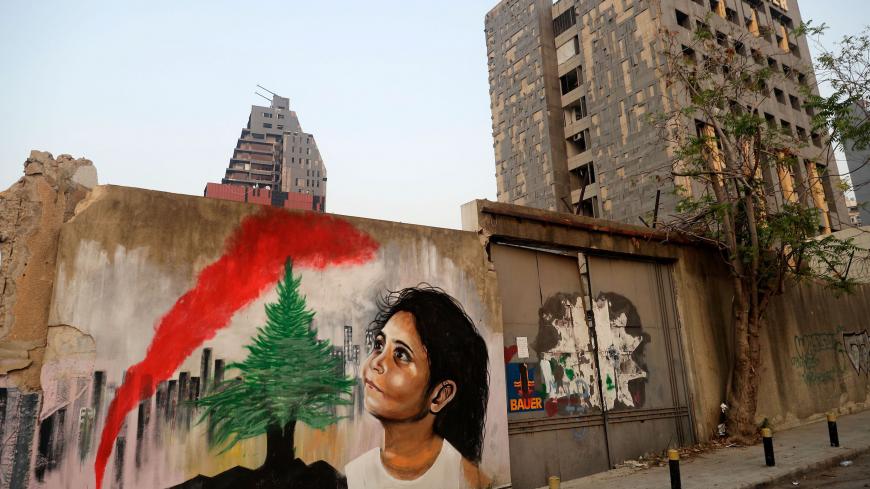 This picture taken on September 4, 2020 shows a mural painting depicting a young Lebanese girl who suffered a face injury in the August 4 massive blast at the nearby seaport, one month after the disaster that left scores of people dead or injured and ravaged swaths of the capital Beirut. (Photo by JOSEPH EID / AFP) (Photo by JOSEPH EID/AFP via Getty Images)