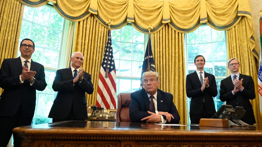 US President Donald Trump is joined by (L-R) US Secretary of the Treasury Steven Mnuchin, US Vice President Mike Pence, Senior Advisor to the President Jared Kushner and US special representative for Iran, Brian Hook, in the Oval Office of the White House in Washington, DC, on September 11, 2020. - Trump announced Friday a "peace deal" between Israel and Bahrain, which becomes the second Arab country to settle with its former foe in the last few weeks. (Photo by ANDREW CABALLERO-REYNOLDS / AFP) (Photo by AN