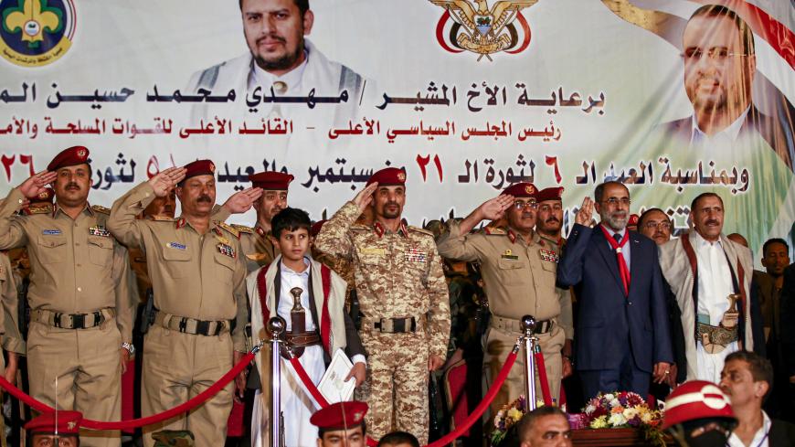 Major General Abdullah Yahya al-Hakim (C), chief of intelligence of the administration of Yemen's Huthi rebels in control of the capital Sanaa, and other Huthi officials attend an official parade commemorating the sixth anniversary of the Huthi takeover of the capital Sanaa on September 20, 2020. (Photo by MOHAMMED HUWAIS / AFP) (Photo by MOHAMMED HUWAIS/AFP via Getty Images)