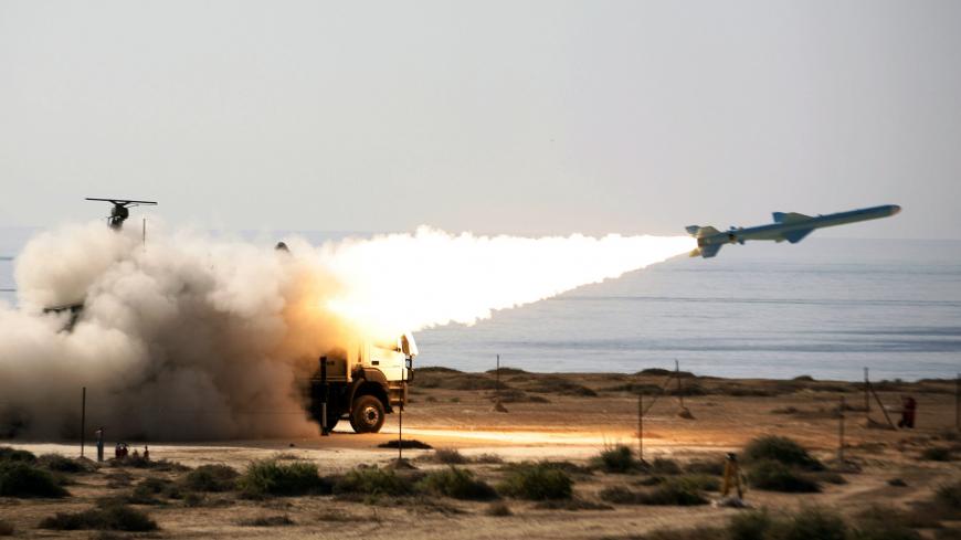 Iranian 200-kilometre (120-mile) range Qader (Ghader) ground-to-sea missile is launched on the last day of navy war games near the Strait of Hormuz in southern Iran on January 2, 2012. AFP PHOTO/JAMEJAMONLINE/EBRAHIM NOROOZI (Photo credit should read EBRAHIM NOROOZI/AFP via Getty Images)