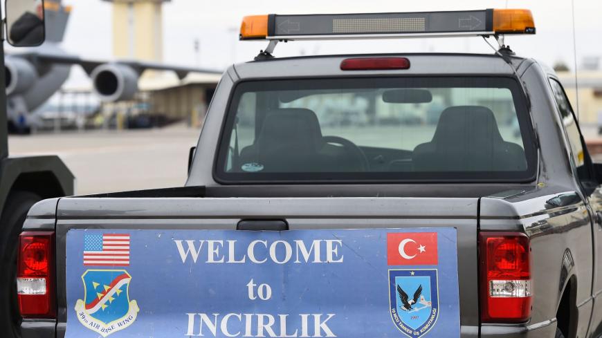 A service vehicle with a sign reading 'Welcome to Incirlik' is pictured at the air base in Incirlik, Turkey, on January 21, 2016. / AFP / POOL / TOBIAS SCHWARZ        (Photo credit should read TOBIAS SCHWARZ/AFP via Getty Images)
