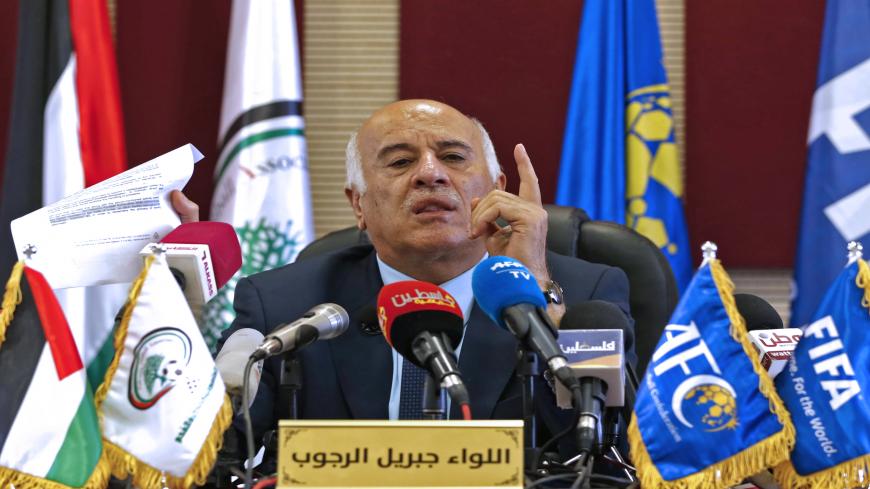 Palestinian Football Association (PFA) head and member of the Fatah Central Committee, Jibril Rajoub, speaks during a press conference in the West Bank city of Ramallah on September 3, 2018. - The head of the Palestinian football association pledged on September 3 to appeal a 12-month ban and 20,000 Swiss francs ($20,600, 17,700 euros) fine against him by FIFA over comments made about Lionel Messi for "inciting hatred and violence", after calling on fans to burn the latter's pictures and jerseys in the buil