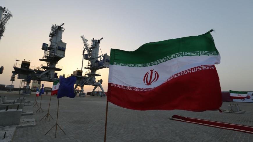 Iranian flags flutter during an inauguration ceremony for new equipment and infrastructure  on February 25, 2019 at the Shahid Beheshti Port in the southeastern Iranian coastal city of Chabahar, on the Gulf of Oman. - With the web of US sanctions tightening, Iran faces a host of challenges as it looks to an isolated port in the country's far southeast to maintain the flow of goods.  The port in Chabahar, only about 100 kilometres (62 miles) from the Pakistan border and located on the Indian Ocean, is Iran's