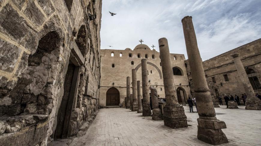 This picture taken on April 6, 2019 shows a view of a courtyard in the Coptic Orthodox "White Monastery" of St Shenouda (Schenute) the Archimandrite in Egypt's southern Sohag province, about 500 kilometres south of the capital Cairo. - Dating back to the second half of the 5th century AD, the monastery is named name for the colour of its white limestone outside walls. It is architecturally similar to the nearby "Red Monastery". (Photo by Khaled DESOUKI / AFP)        (Photo credit should read KHALED DESOUKI/