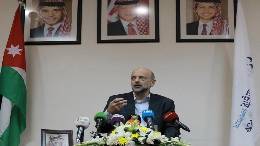 Jordan's Prime Minister Omar al-Razzaz gives a press conference in the southern port city of Aqaba on July 23, 2019, discussing projects in the area including an underwater military museum. (Photo by Khalil MAZRAAWI / AFP)        (Photo credit should read KHALIL MAZRAAWI/AFP via Getty Images)