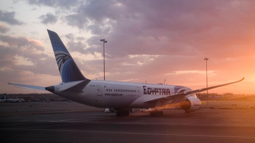 This picture taken on January 16, 2020 shows an EgyptAir Boeing 787-9 "Dreamliner" jet parked on the tarmac at Cairo International Airport outside the Egyptian capital. (Photo by Amir MAKAR / AFP) (Photo by AMIR MAKAR/AFP via Getty Images)