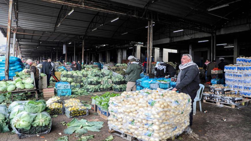 This picture taken on February 2, 2020 shows a view of a produce market in the occupied West Bank Palestinian city of Nablus, following the announcement of Israeli Defence Minister Naftali Bennett to halt imports of all agricultural goods from the West Bank into Israel. (Photo by Jaafar ASHTIYEH / AFP) (Photo by JAAFAR ASHTIYEH/AFP via Getty Images)
